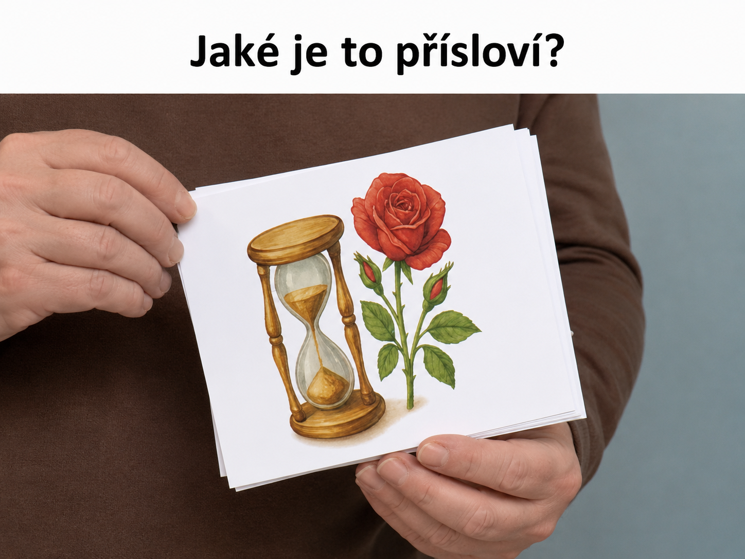 Karta s obrázkem přesýpacích hodin a růže držená v rukou, nadpis Jaké je to přísloví